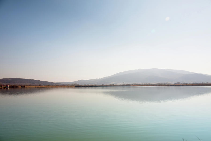 Big lake near the mountain in the morning Photograph by Iuliia Malivanchuk