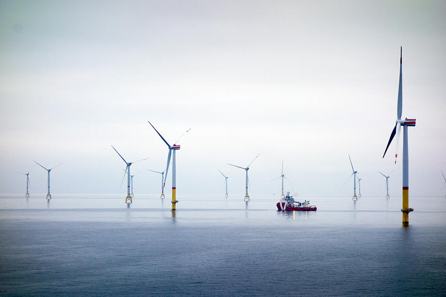 Big Offshore wind-farm with transfer vessel Photograph by CharlieChesvick