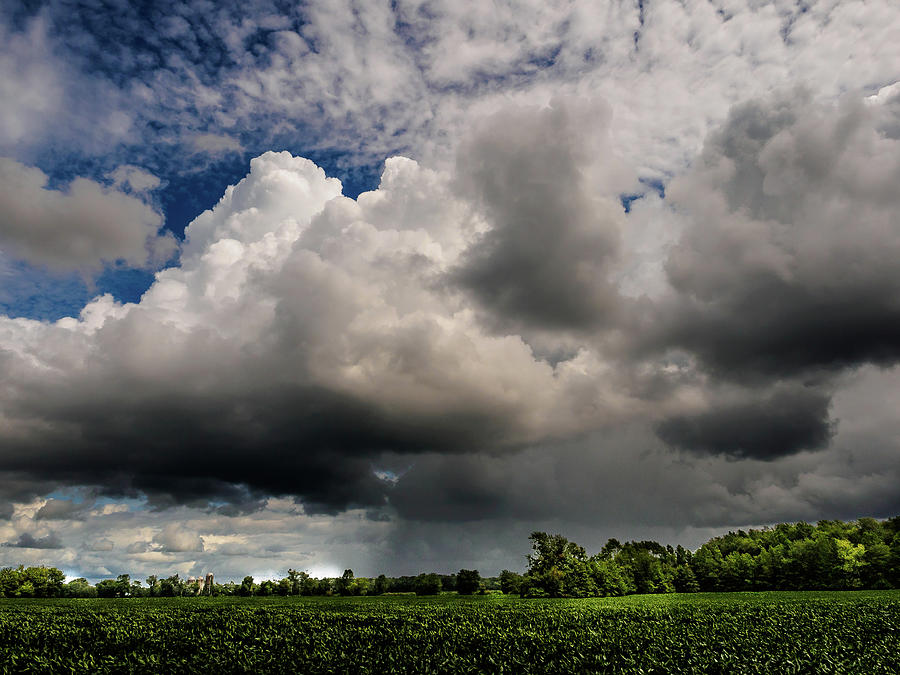 Big Rain Clouds Photograph by Louis Dallara
