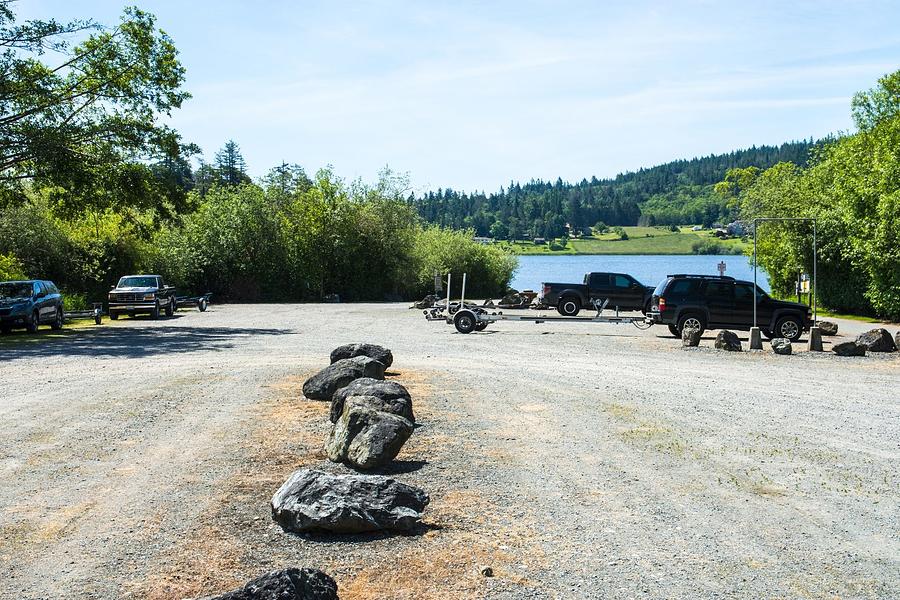 Big Rocks and Boat Trailers at Lake Campbell Photograph by Tom Cochran