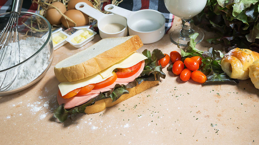 Big Sandwich With Ham, Cheese And Vegetables On Woodboard Photograph by Ultramansk
