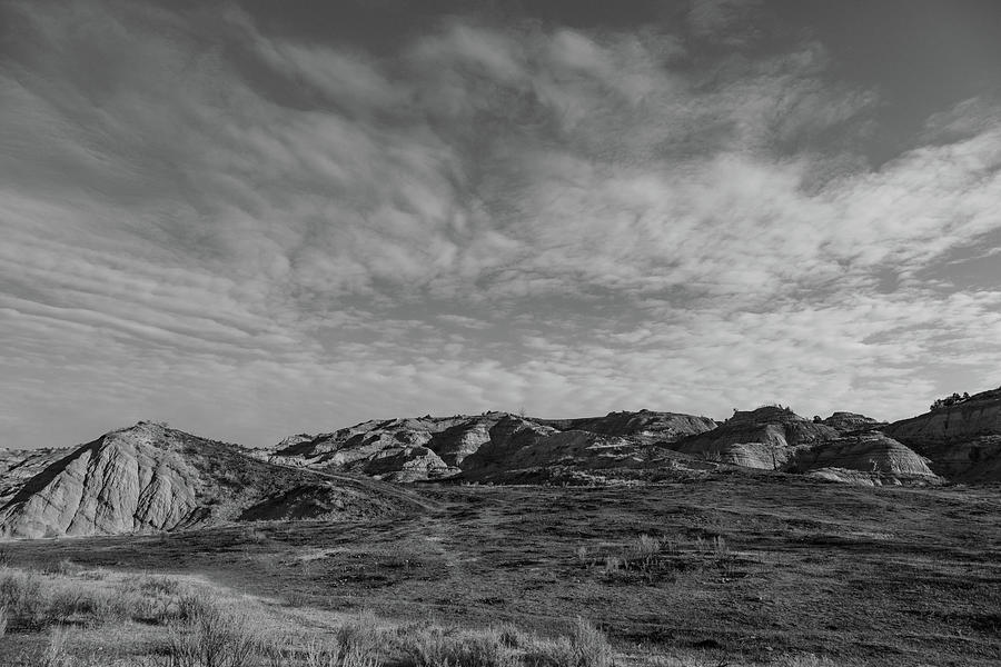 Big Sky at Theodore Roosevelt National Park in black and white Photograph by Eldon McGraw