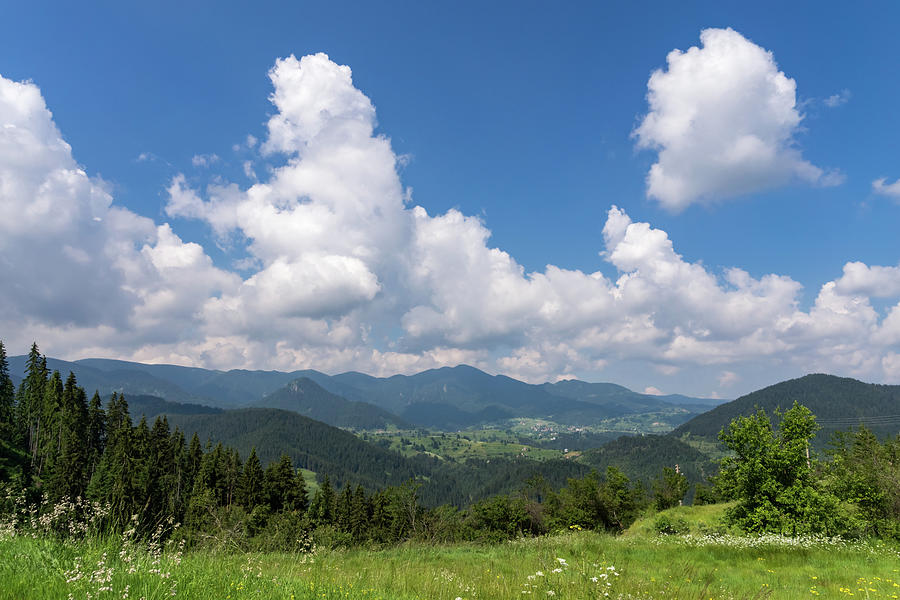 Big Sky Country - Distant Village and Splendid Clouds in the Rhodope Mountains Photograph by Georgia Mizuleva