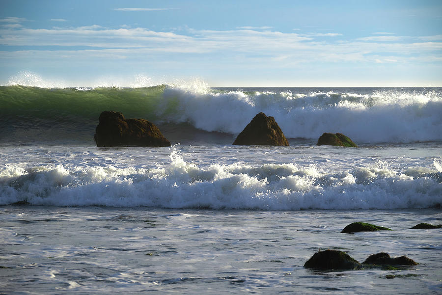 Big Wave Approaching the Rocks Photograph by Matthew DeGrushe