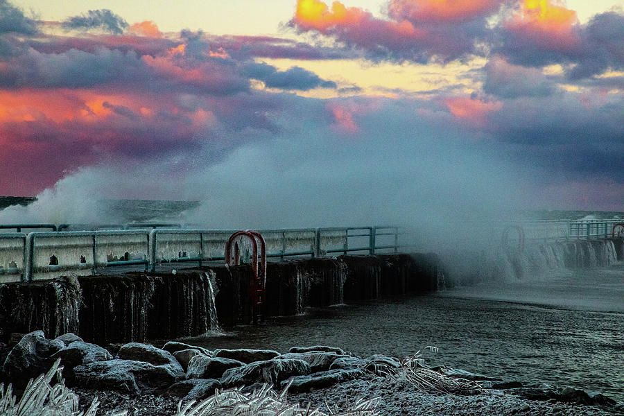 Big wave crashing on Lake Huron in early winter in Port Austin Michigan Photograph by Eldon McGraw