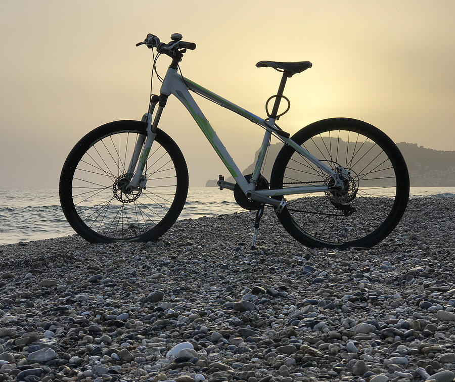 Bike on sunset beach Photograph by Jasmin Merdan