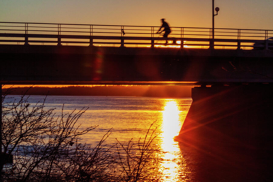 Bike rider at sunset Photograph by Tatiana Travelways