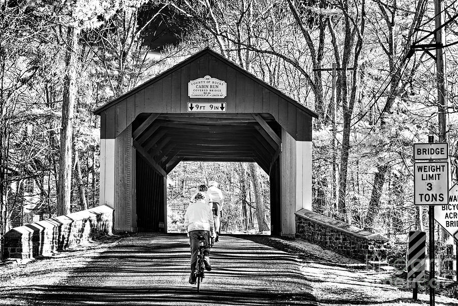 Biking Under Cabin Run in Bucks County Photograph by John Rizzuto