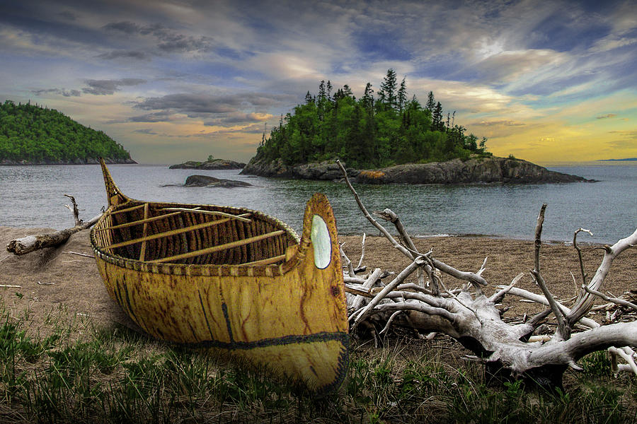 Birch Bark Canoe on Driftwood Beach by WaWa  Photograph by Randall Nyhof