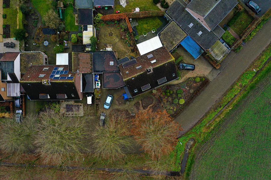 Bird eye view of a street in a small city in Europe lined with l ...