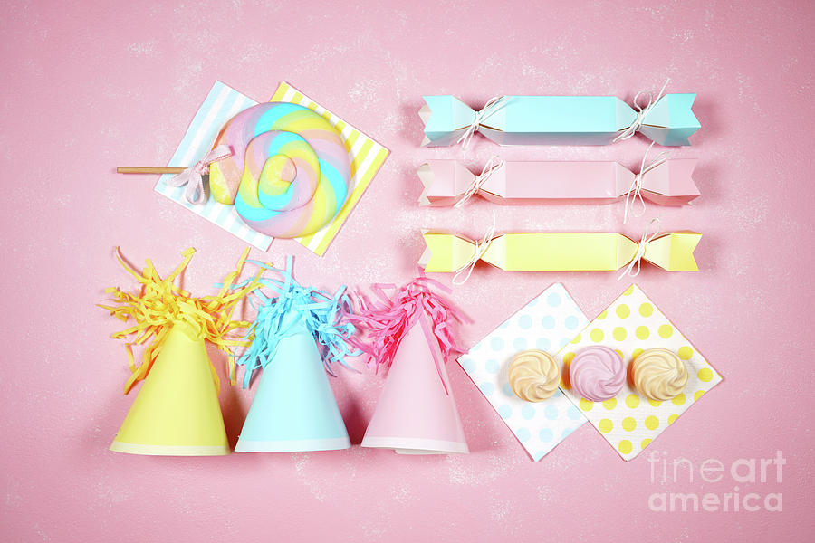 Birthday and party theme flatlay styled with party hats and bon bons. Photograph by Milleflore Images
