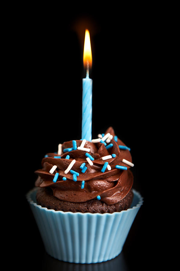 Birthday cupcake on black Photograph by Sandoclr