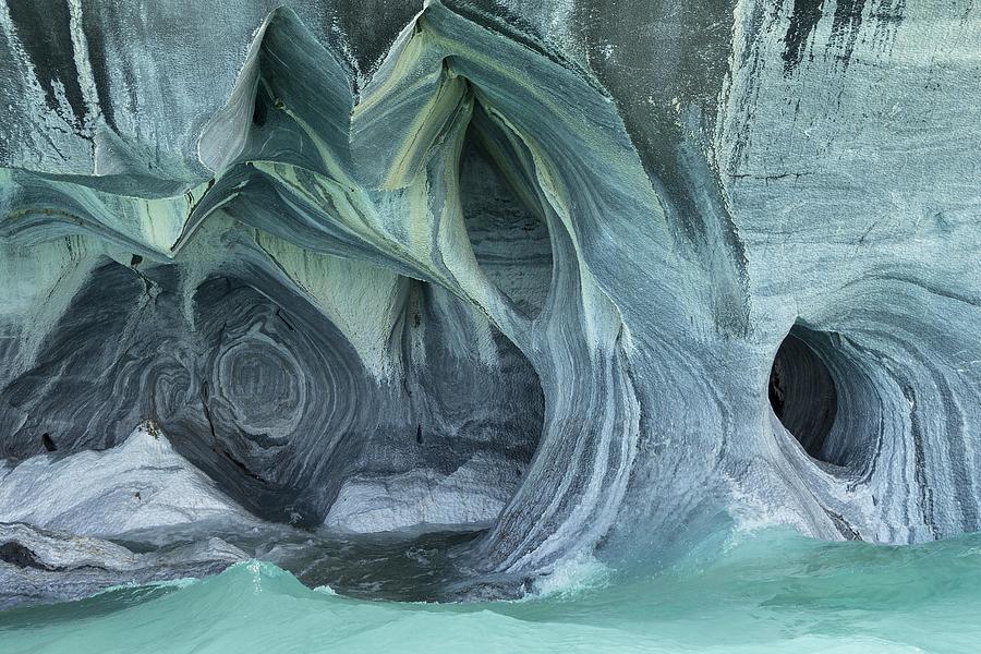 Bizarre rock formations of the marble caves, Cuevas de Marmol, Lago General Carrera, Puerto Rio Tranquilo, Region de Aysen, Chile Photograph by Peter Giovannini