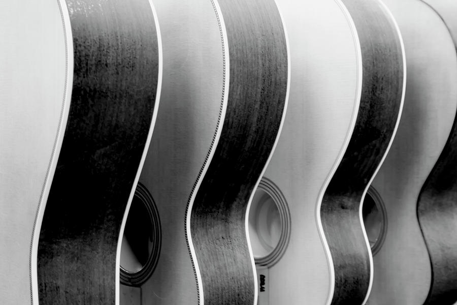 Black and white acoustic wood guitar bodies Photograph by Karen Foley