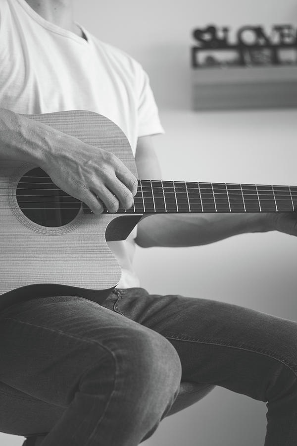 Black And White Artist Strumming A Guitar Photograph