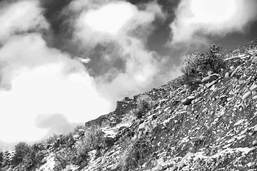 Black And White Clouds Over A Mountain Photograph