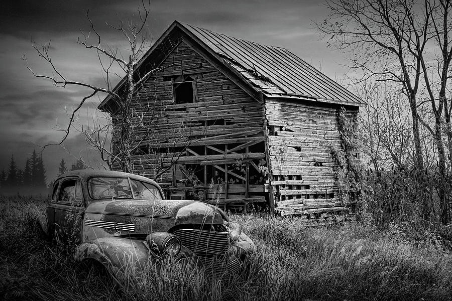 Black and White of Abandoned Rusty Red Car with Weathered Barn i Photograph by Randall Nyhof