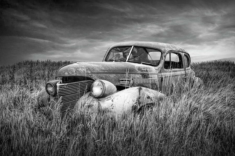 Black and White Photograph  of an Abandoned Chevy Auto out to Pa Photograph by Randall Nyhof