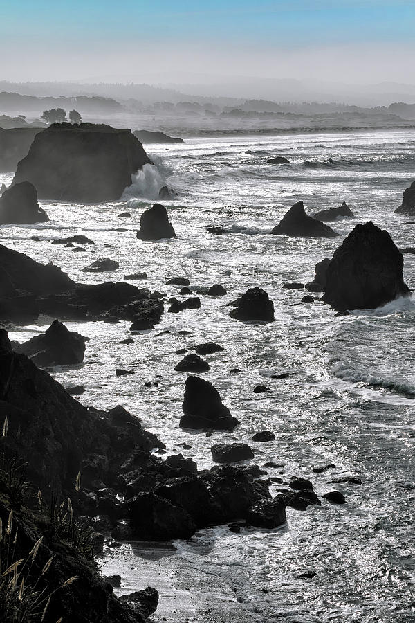 Black and White Seascape Beneath a Pale Blue Sky on the Mendocino Coast  Photograph by Kathleen Bishop