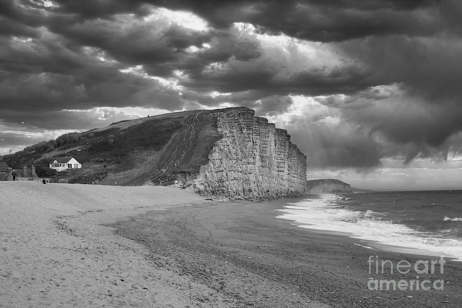 Black and white West bay beach and cliffs Photograph by Ann Biddlecombe ...