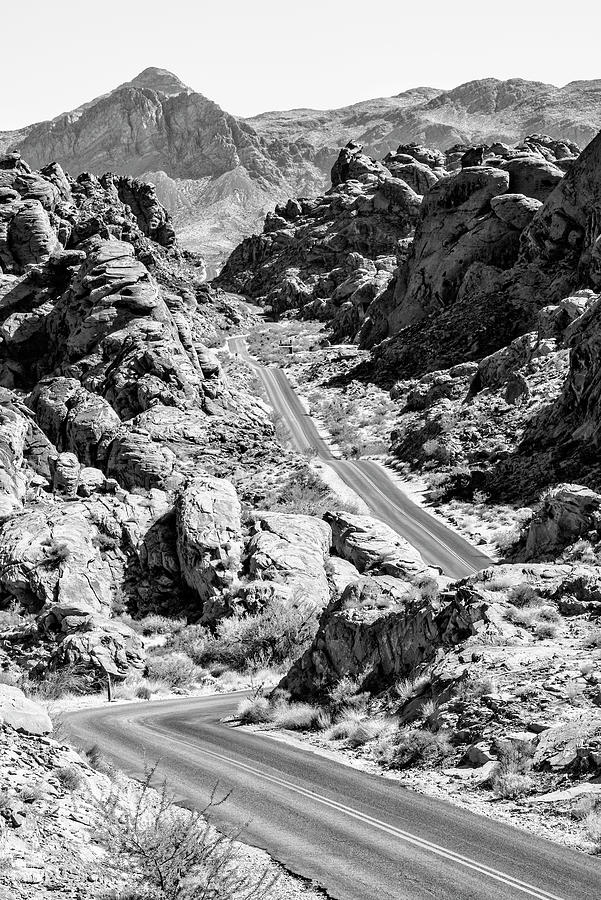 Black Arizona Series - Road between Rocks Photograph by Philippe HUGONNARD