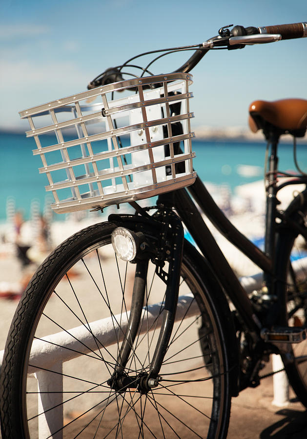 Black bicycle at seashore Photograph by Jean-Marc PAYET