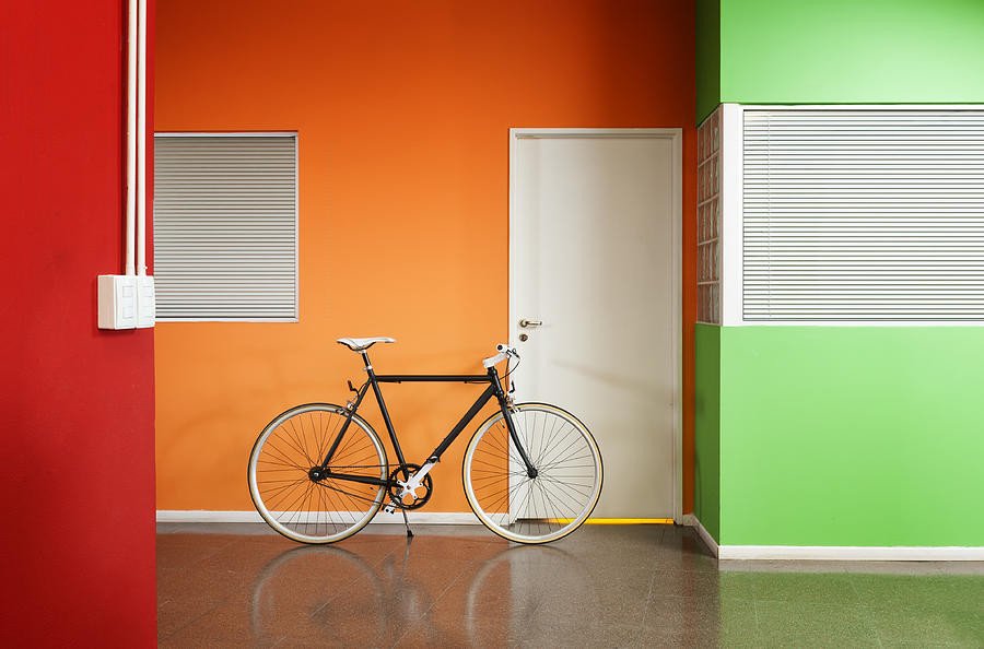 Black bicycle at the office. Photograph by Carlosalvarez