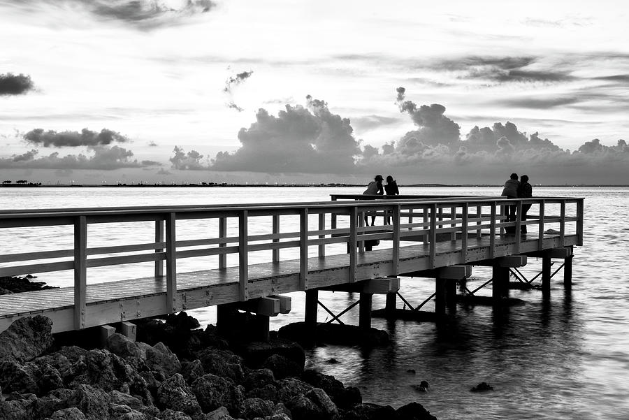 Black Florida Series - Lovers on the pier at sunset Photograph by Philippe HUGONNARD