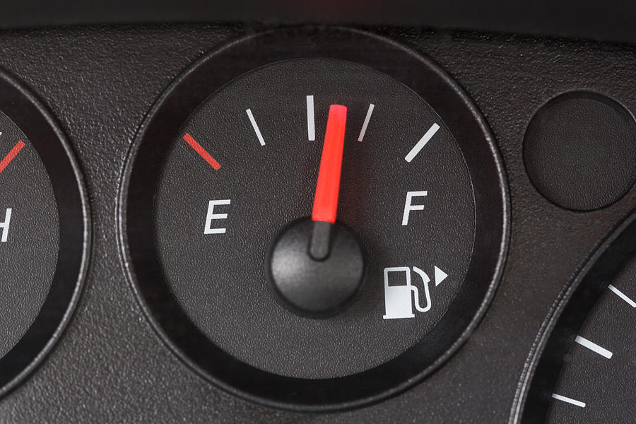 Black Fuel Gauge with Red Marker Over Half Full Photograph by DaydreamsGirl