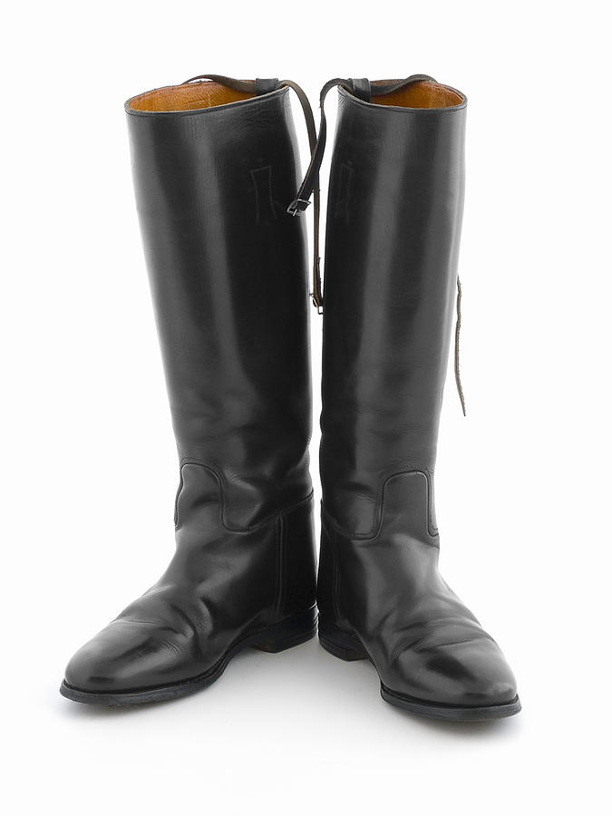 Black leather riding boots on white Photograph by 221a