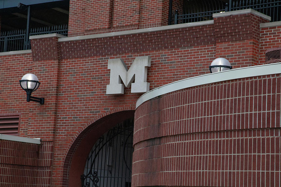 Black M and brick at Michigan Stadium Photograph by Eldon McGraw