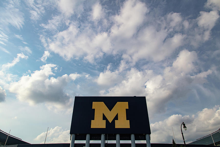 Black M with big sky at Michigan Stadium Photograph by Eldon McGraw