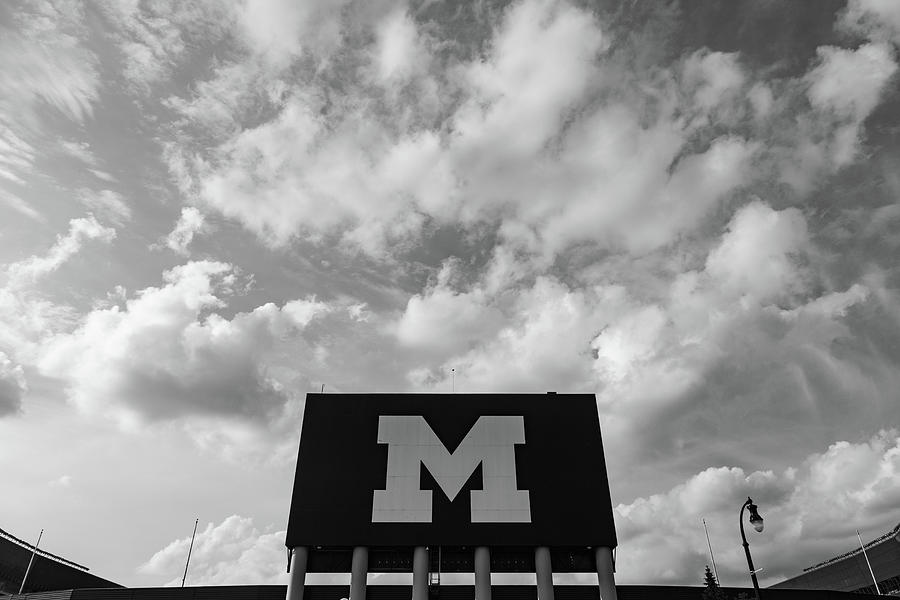 Black M with big sky at Michigan Stadium in black and white Photograph by Eldon McGraw