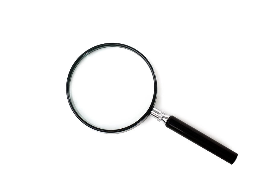 Black magnifying glass on a white background Photograph by J-Elgaard