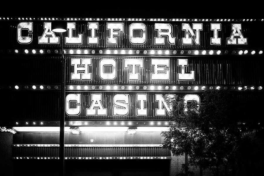 Black And White Photograph - Black Nevada Series - Fremont California Hotel Casino by Philippe HUGONNARD