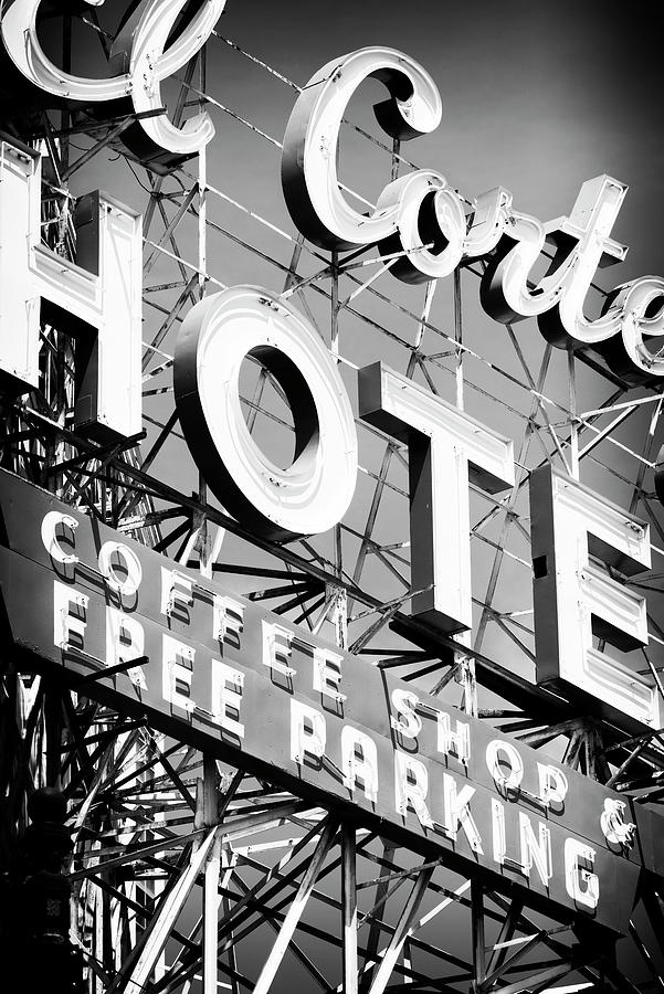 Black And White Photograph - Black Nevada Series - Vegas Hotel Sign by Philippe HUGONNARD