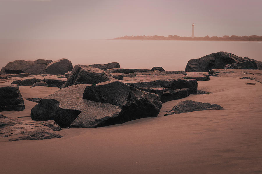 Black Rocks and Drifting Sands of Cape May Beach Photograph by Jason Fink