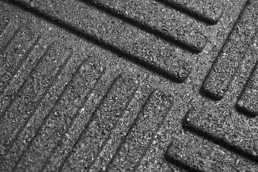 Black rubber mat Photograph by Youngvet