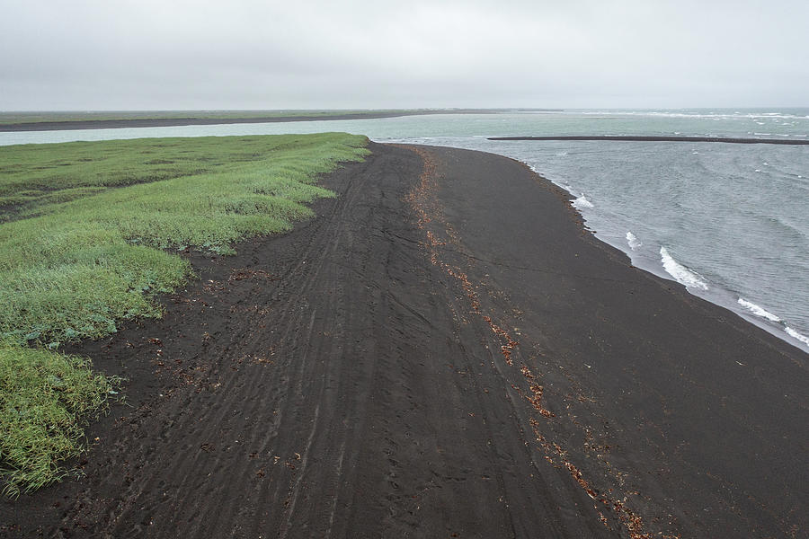 Black sand in Iceland Photograph by John McGraw