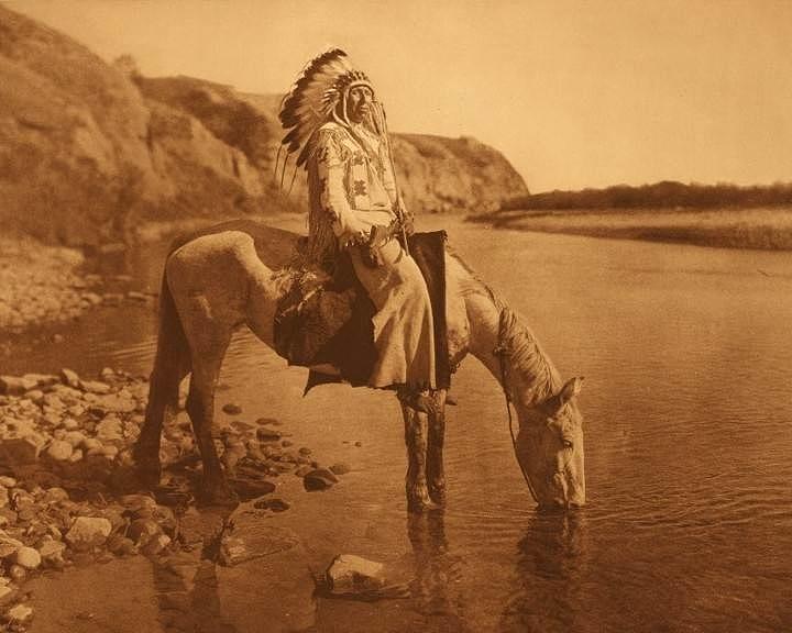 Native American Indian Photograph - Blackfoot River Indian Warrior Chief by Peter Nowell