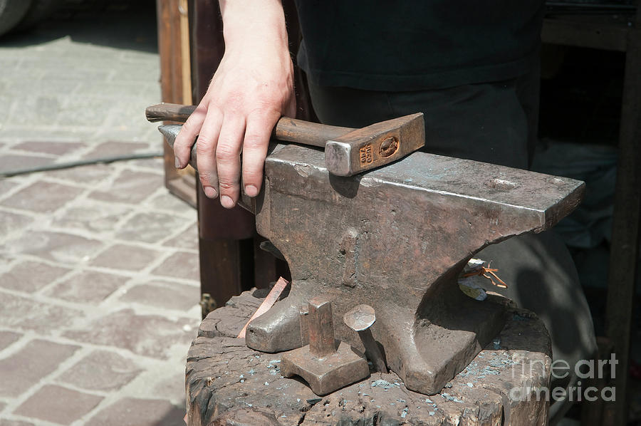 Blacksmith holding hammer in one's hand Photograph by Dariusz Gora ...