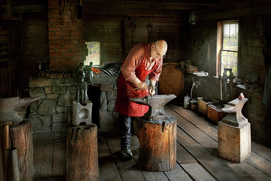 Blacksmith - The heat is on Photograph by Mike Savad