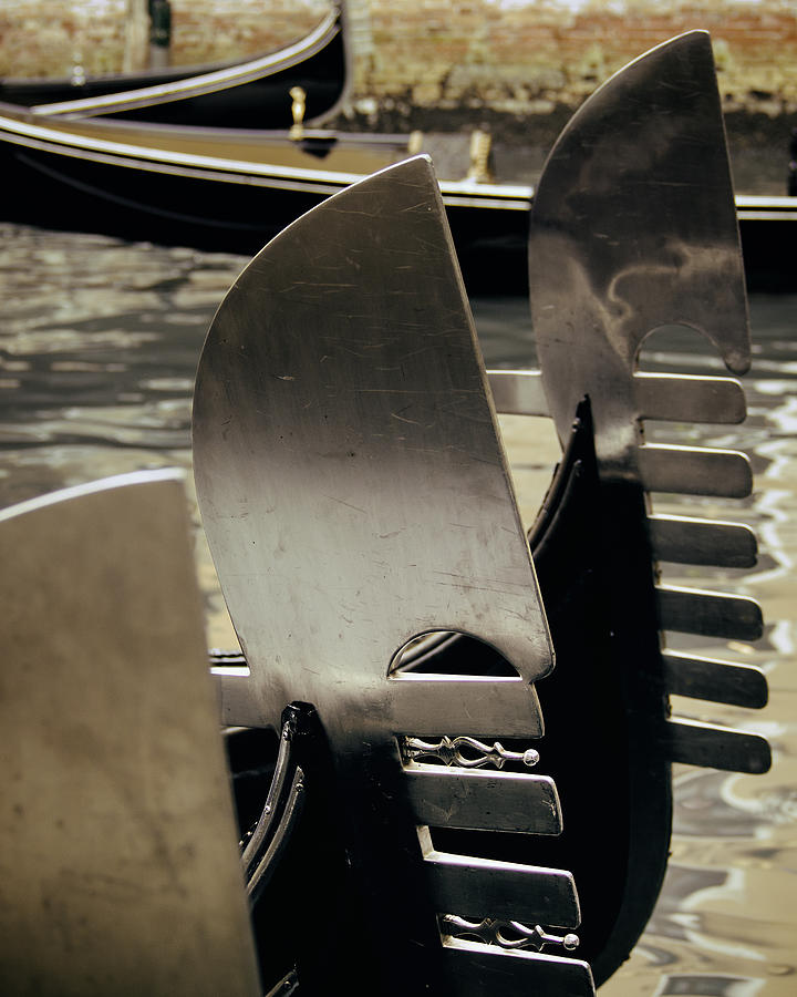 Blades of Gondolas in Venice Photograph by Bernd Schunack