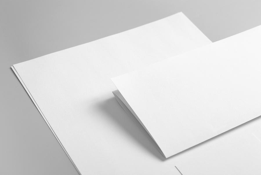 Blank basic stationery. Letterhead flat and folded, business card. Photograph by --zirko--