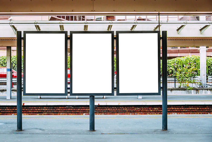 Blank billboards at train station Photograph by Photography taken by Mario Gutiérrez.