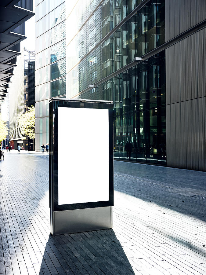 Blank electronic billboard on busy street in London Photograph by Shomos Uddin