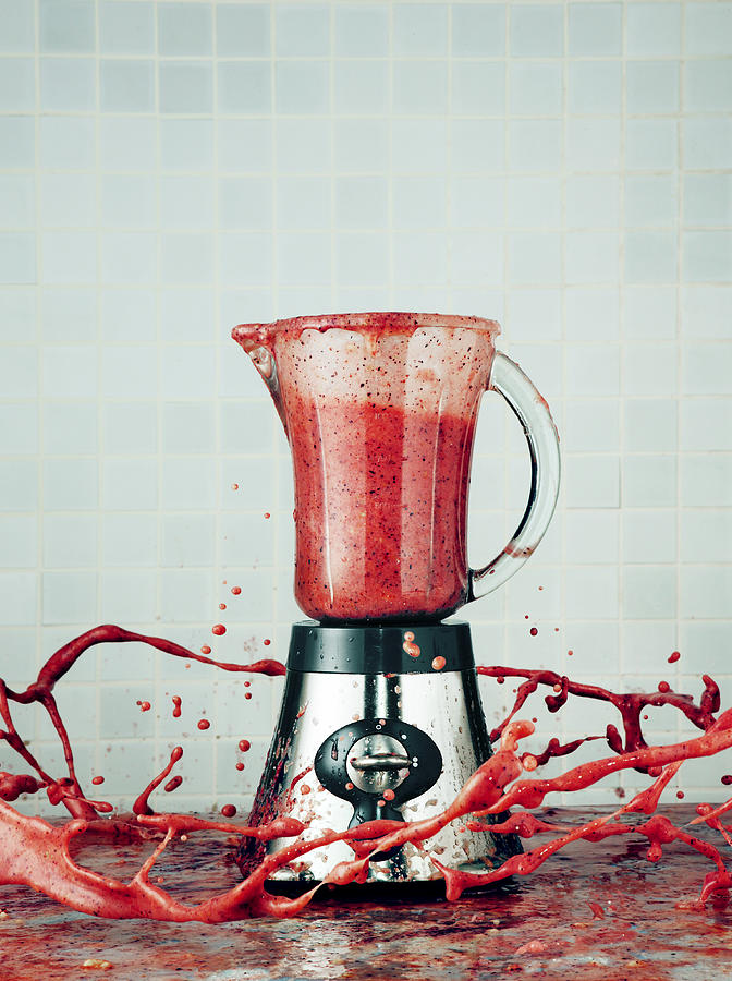 Blender making a Smoothie explodes its contents into the air Photograph by Jonathan Kitchen