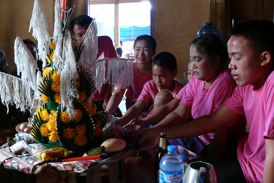 Blessing ceremony in Laos 2 Photograph by Robert Bociaga