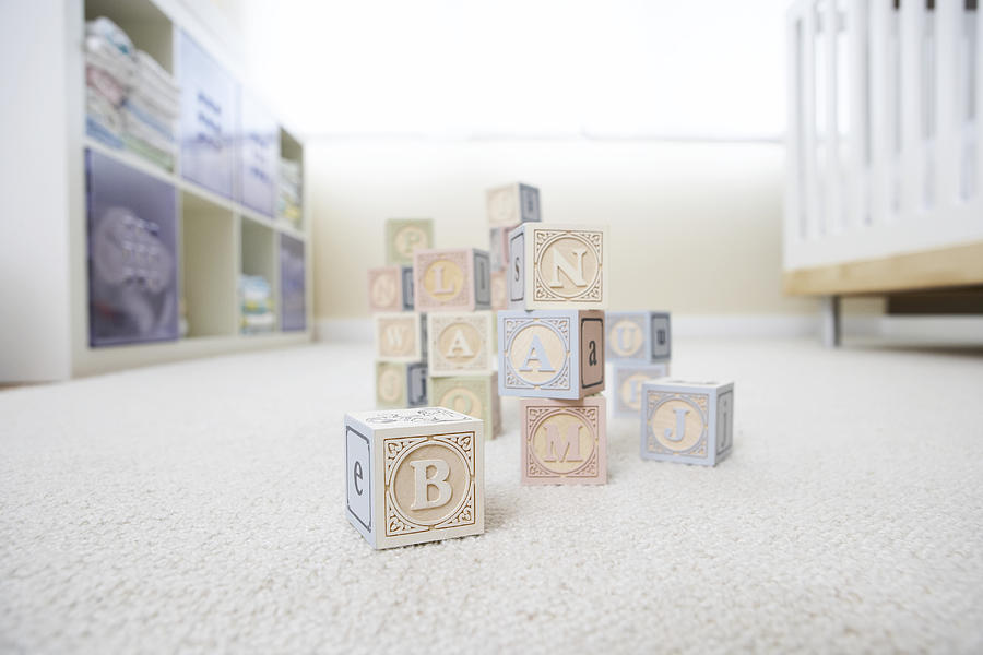 Blocks on nursery floor Photograph by Noel Hendrickson