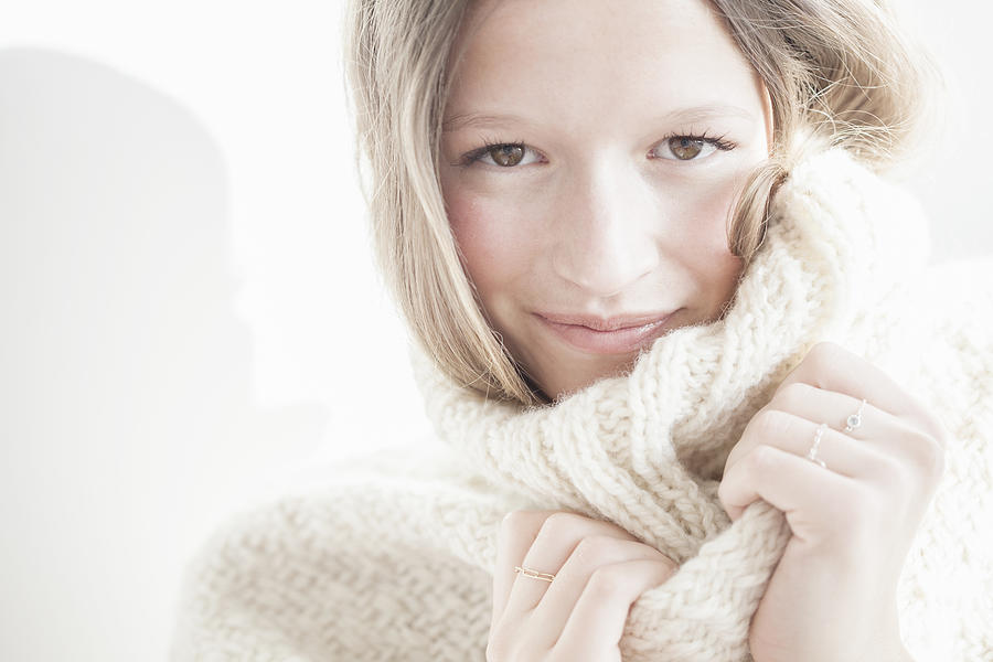 Blond woman wears a cosy woolen pull-over Photograph by Letizia McCall